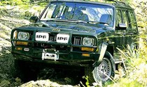 97-01 Jeep Cherokee (Xj) Base, Country, Se, Sport ARB Custom Front Bumper - Bull Bar Winch Mount Minor Modifications May Be Required When Fitting Large Diameter Lamps (Front) (Paintable)