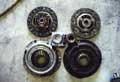 we decided to replace the old clutch with a new heavy duty one while the gearbox was out of the car - here's the new one next to the old one